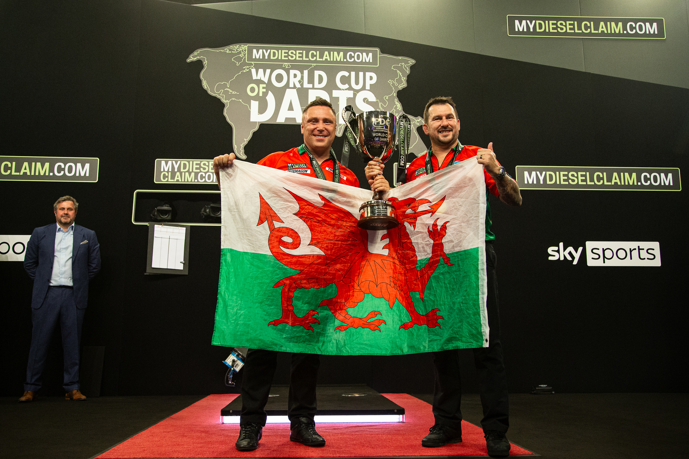 Wales siegte mit Price und Clayton 2020 und 2023 (Bild: Jonas Hunold/PDC)